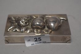 A 20th century silver plated lidded case Portuguese stamped having fruit and vine decoration
