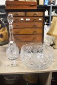 A modern clear cut crystal fruit bowl in a Bohemian style with a similar decanter