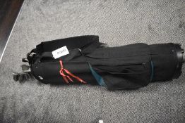 A modern set of golf clubs with bag