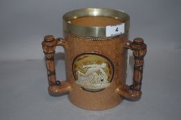 A Doulton Lambeth John Broad and Mary Lilley design cricket tyg 1881 having metal banded rim, in