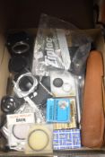 A selection of photographic items including Pentax ME Super A/F, Focus slider, filters, splicer,