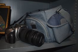 A Canon Eos 300D digital camera with a Tamron macro lens and Canon EFS lens