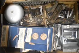 A mixed lot of hardware including vintage cutlery, door handles, decorative wood mouldings and
