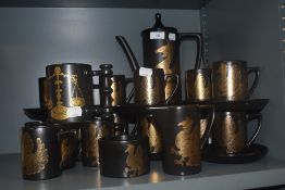 A Portmeirion Phoenix pattern coffee service with additional cup