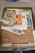 A selection of vintage ephemera including stamps, postcards and news clippings