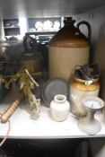 A selection of vintage hardware including salt glazed flagon, brass trivet with kettle, wooden baton