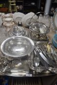 A selection of vintage silver plated serving wares including lidded dishes, fruit basket and