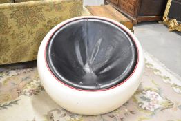 A vintage egg stool
