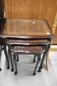 A period style nest of three tables