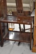 A vintage mahogany tea trolley