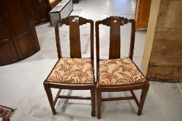 A pair of Art Deco stained frame dining chairs