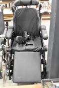 A power assisted disability aid chair, as new