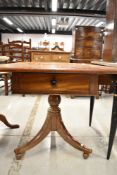 A Victorian mahogany drop leaf pedestal table