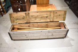 A traditional croquet set , in original wooden case