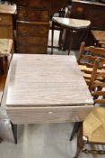 A vintage Formica top kitchen table