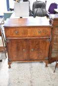 A reproduction Regency style side cabinet