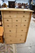 A 19th Century stripped pine merchants style chest, missing doors