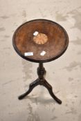 An Edwardian mahogany wine table having inlay decoration