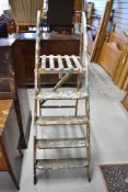 A set of vintage wooden decorators steps