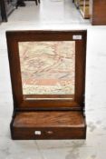 A Victorian oak dressing table or bathroom mirror having drawer base