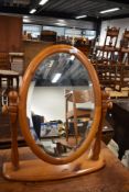 A modern pine dressing table mirror