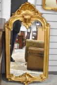 A reproduction gilt frame wall mirror
