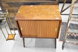 A vintage stained frame record cabinet