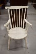 A Victorian painted spindle back arm chair