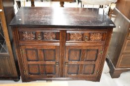 A traditional dark stained sideboard/dresser base