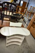 A vintage kidney shaped dressing table
