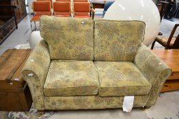 A modern two seater settee, very clean and tidy condition