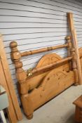 A modern pine king bed frame
