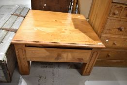 A modern pine square coffee table