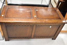 A traditional oak and ply blanket box