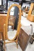 A modern beech cheval mirror