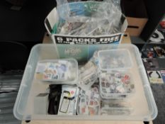 Two boxes of GB & World Kiloware, on and off paper, in individual plastic boxes and bags, many