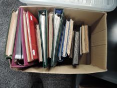 A box of World Stamp Albums, mainly used in 18 albums, stock books and ring binders