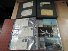 An album of vintage Postcards all showing the reverse with different postmark cancellations, early