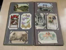 An album of early 20th century Postcards, UK & World, black & white real photo cards, humour etc