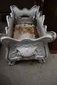 A reproduction cast aluminium planter in classical style