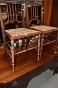 A pair of Edwardian mahogany cane seated bedroom chairs