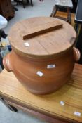 A large earthenware crockpot