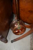 Two traditional copper warming pans
