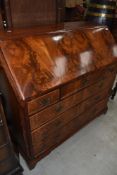 A nice quality 19th Century flame mahogany bureau having typical fitted interior and fall flap and