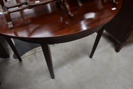 A 19th Century mahogany demi lune side table , possibly a D end originally