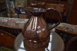 A 19th Century copper jug of large proportions