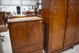 An early 20th Century mahogany two piece bedroom suite