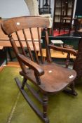 A Victorian stained frame Childrens rocking chair