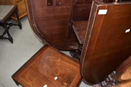 A reproduction Regency dining table and similar occasional table
