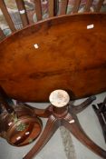 A reproduction Regency yew wood coffee table